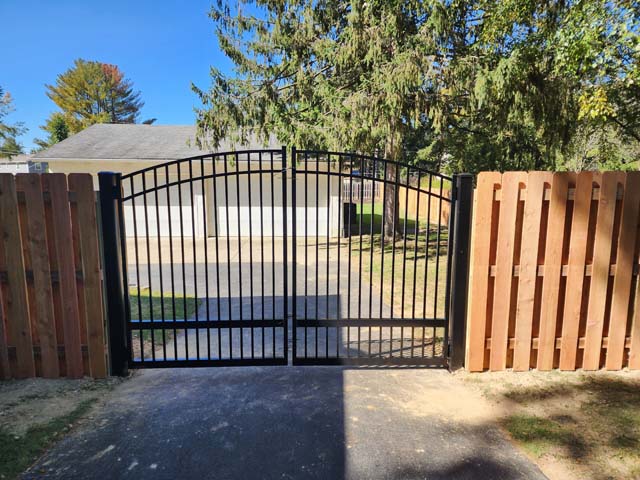 Custom aluminum driveway gate installed by ACE Fence & Deck