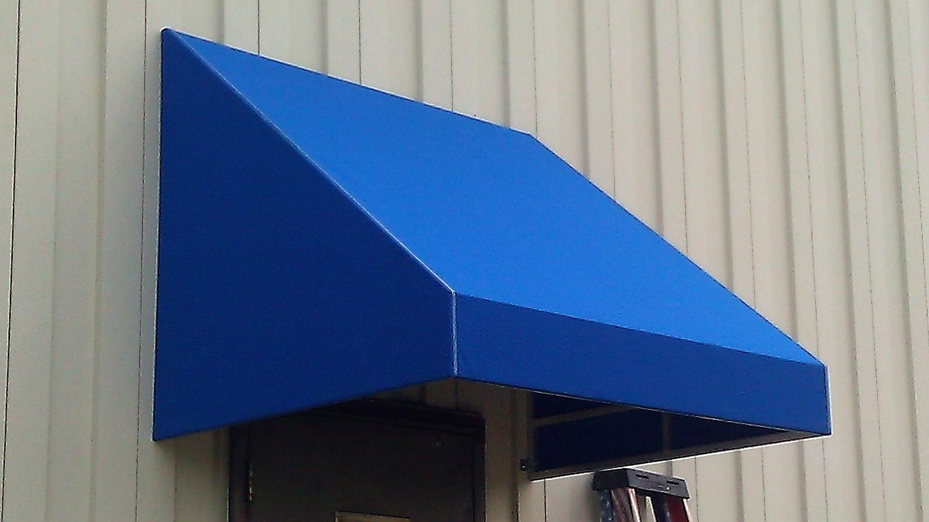 Custom awning providing shade for outdoor living area